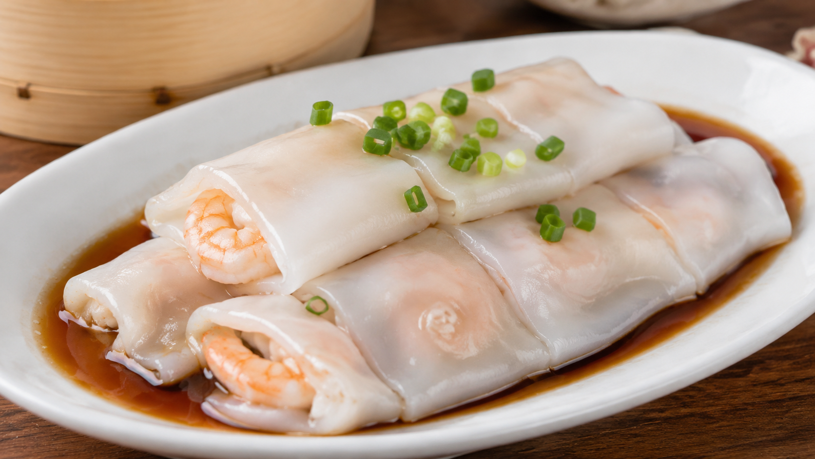 Cantonese shrimp cheung fun rice noodle rolls with scallions and sweet soy sauce
