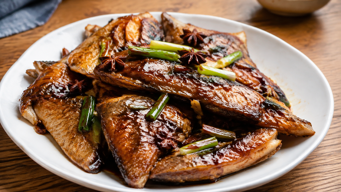 Shanghai smoked fish fillets glazed with sweet soy sauce, scallions and star anise